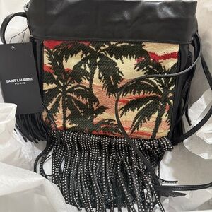 Saint Laurent YSL Black Helena fringe shoulder bag.